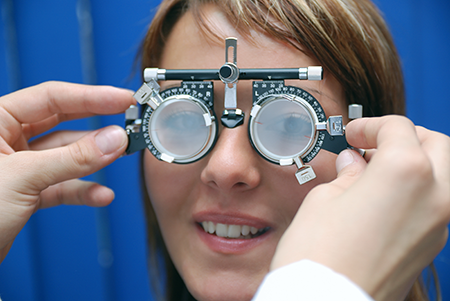 Girl getting a vision exam.