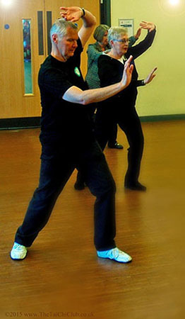 men and women doing yoga exercise