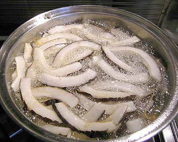 Cocos fries bubbling. coconut fries
