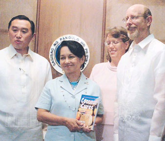 Left to right:  Secretary Yapp, Philippine President Arroyo, Leslie and Bruce Fife.